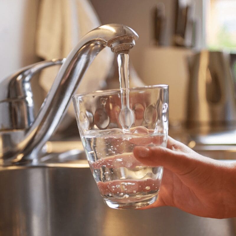 _tap water pouring into a glass of water tap water pouring into a glass of water