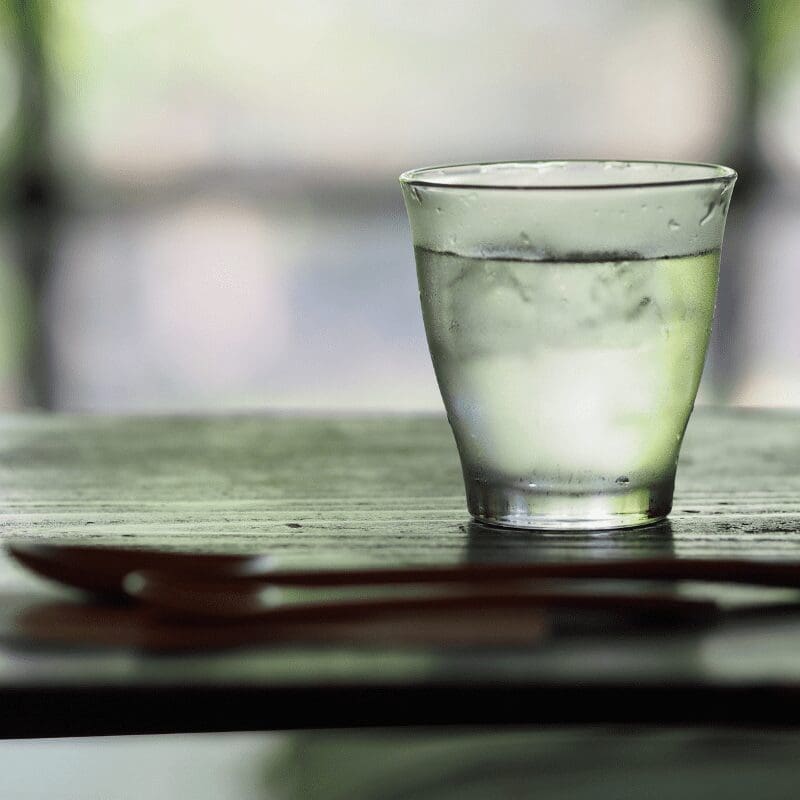 _A glass of water with ice. A glass of water with ice.