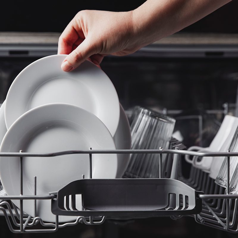 unloading dishwasher