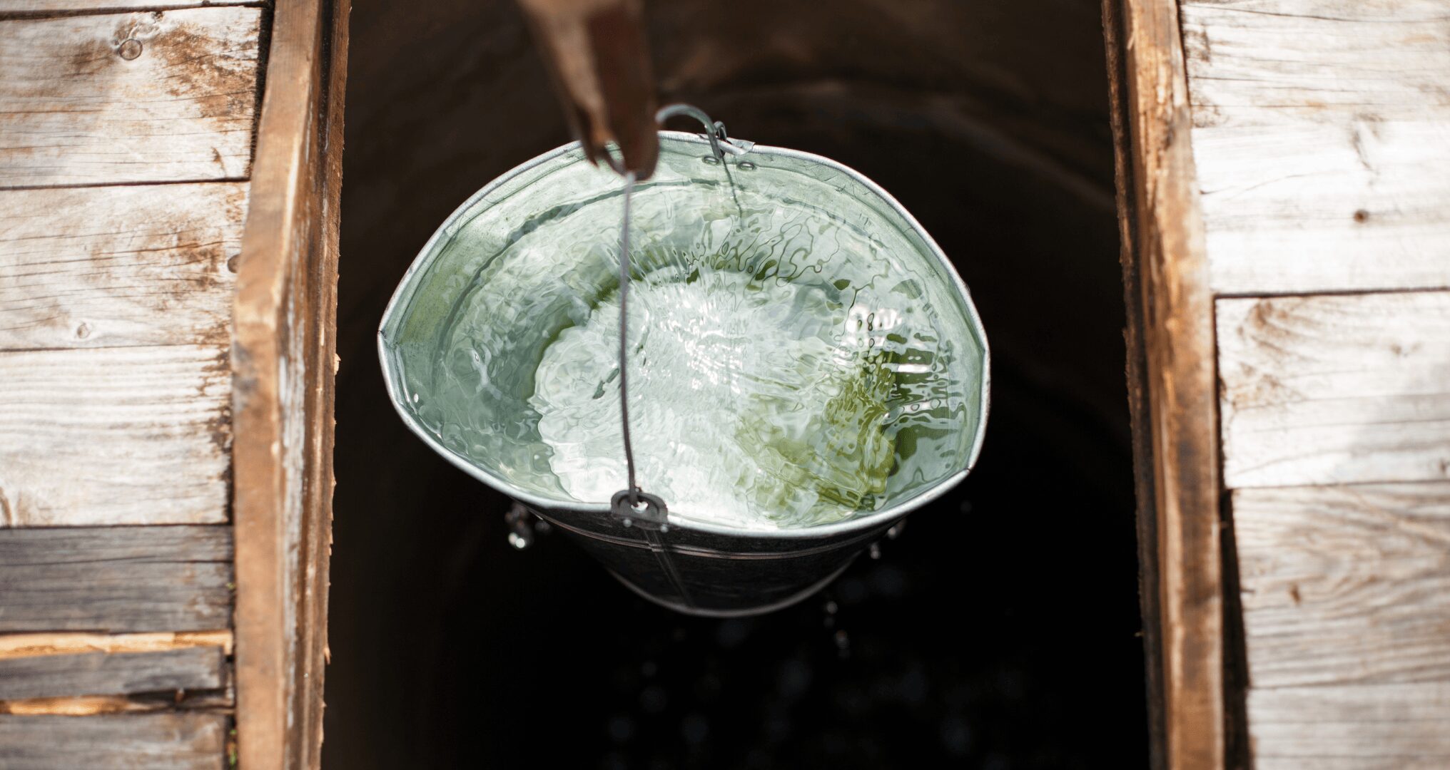 Is Texas Well Water Clean well bucket drawing water