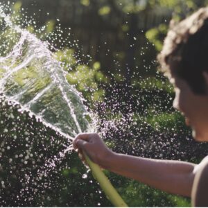 kid with hose