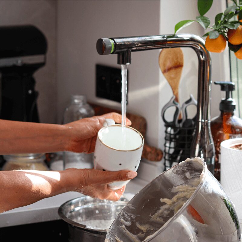 closeup-of-female-hands-washing-dirty-dishes-in- close up of woman in southern texas washing dishes